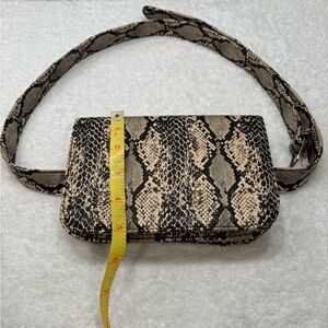 New poly-vinyl snake skin look Fanny pack. Black, white & gray colors